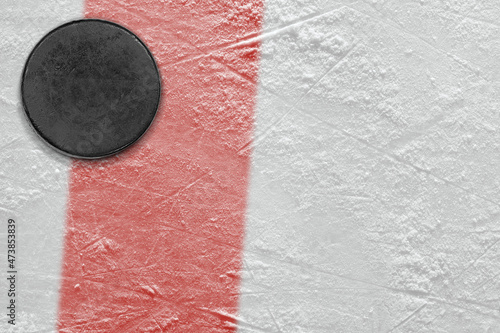 Ice hockey puck with red line