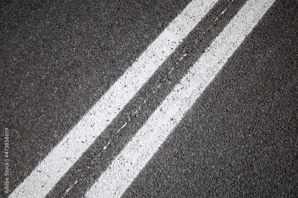 double solid line on the road background.