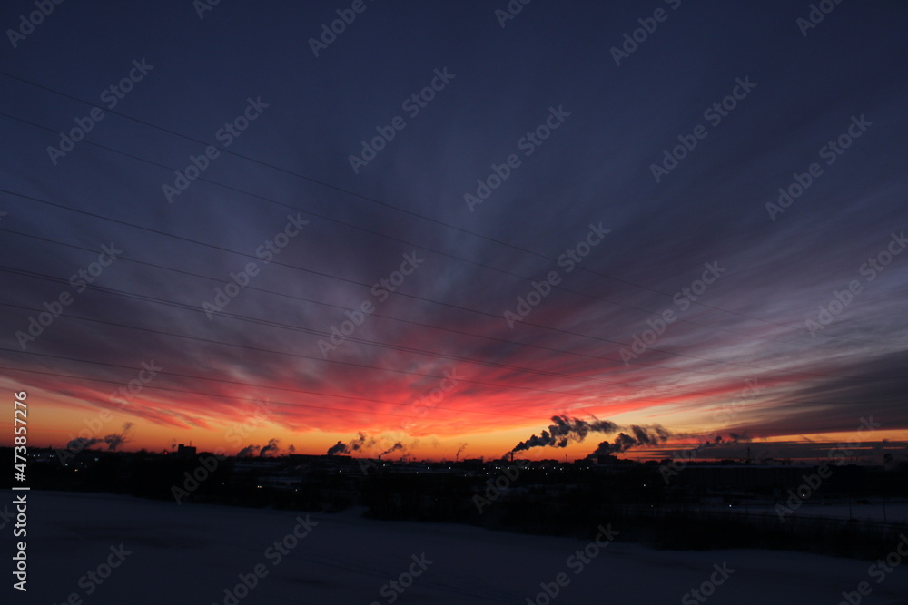 Fantastic bright colorful winter sunset in the city Fantastic bright colorful winter sunset in the city