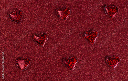 Happy Valentine Day. Valentines day background design. Valentine background. Festive composition with red hearts on a red background. Top view, copy space. Valentine's day concept.