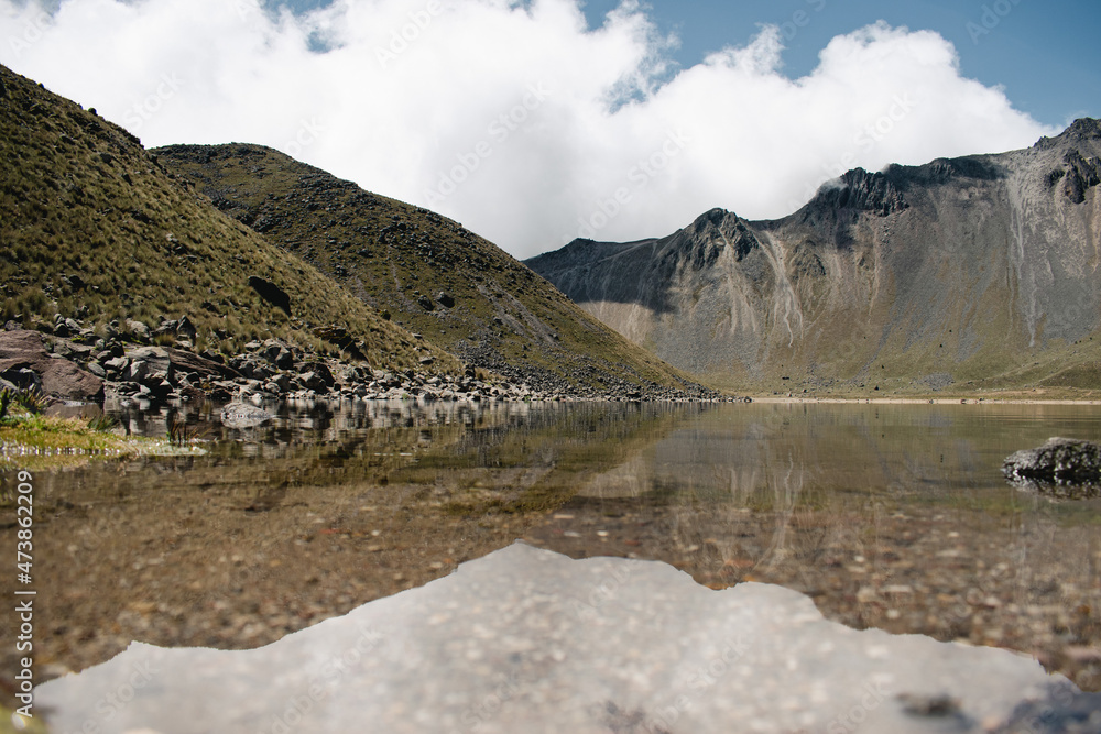 Fototapeta premium Volcano reflection in a lake in mexico