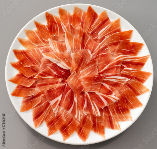 Plate with delicious slices of ham