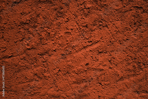 Red-brown colored cement plaster wall texture