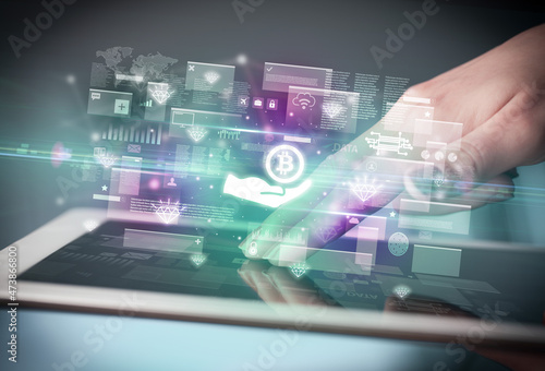 Wallpaper Mural Close-up of a hand using tablet, currency concept Torontodigital.ca