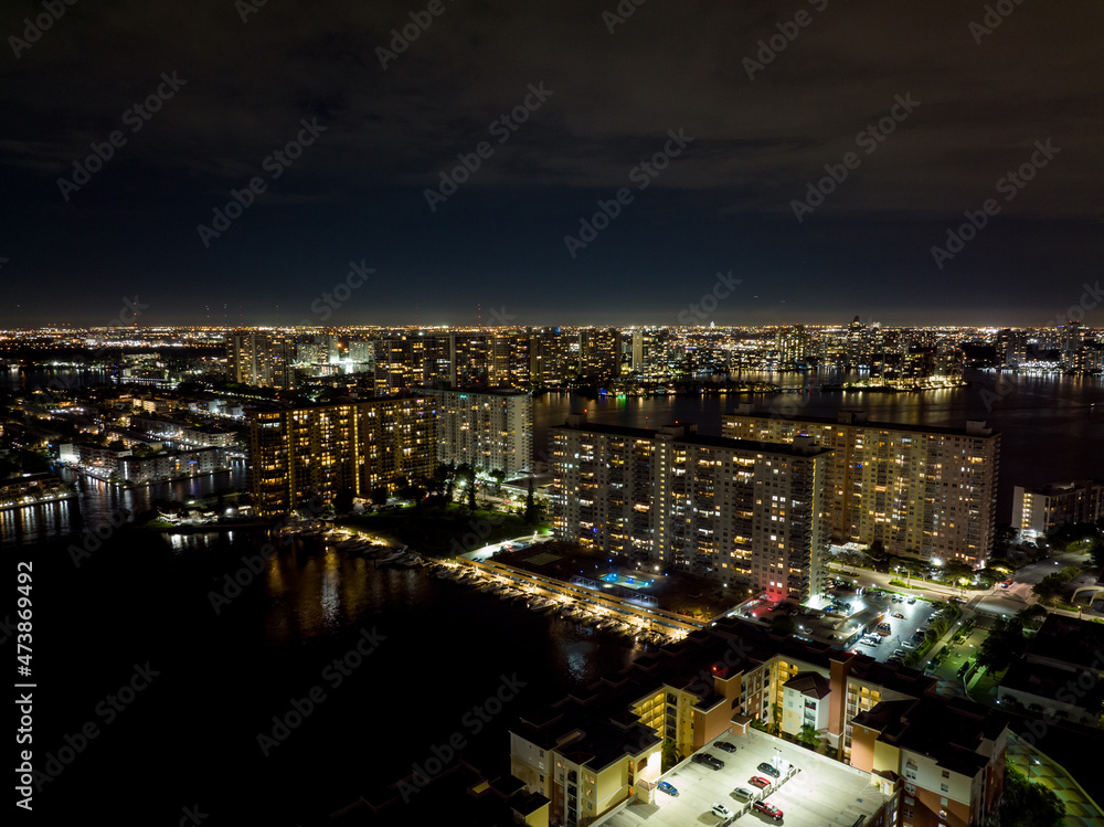 Condominiums in Miami FL night aerial photo