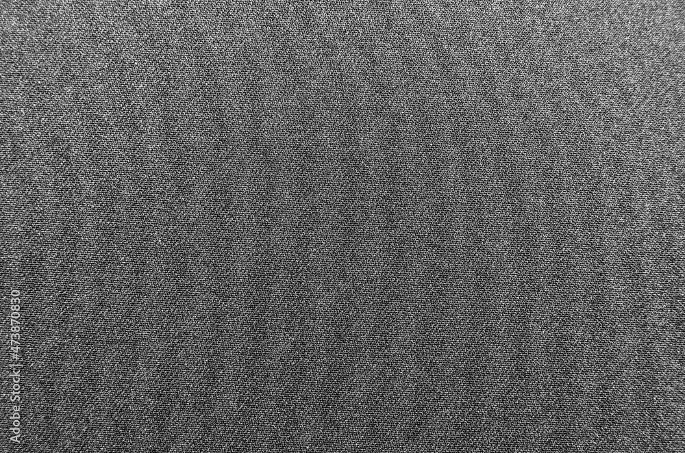 Fabric. The background is made of satin or silk fabric. Material for sewing clothes and the work of a fashion designer, designer and seamstress Fabric. The background is made of satin or silk fabric. Material for sewing clothes and the work of a fashion designer, designer and seamstress