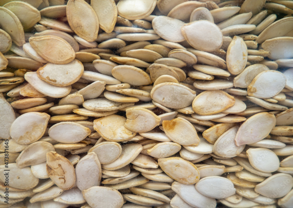 Mountains of pumpkin seeds. Healthy diet. On the counter of the store. Mountains of pumpkin seeds. Healthy diet. On the counter of the store.