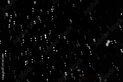 beautiful winter background snowflakes isolated on black