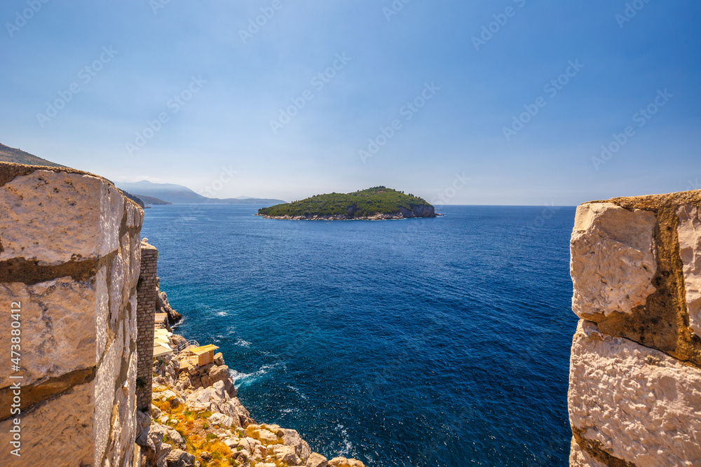 View of Lokrum island from the walls of the city of Dubrovnik in Croatia, Europe.