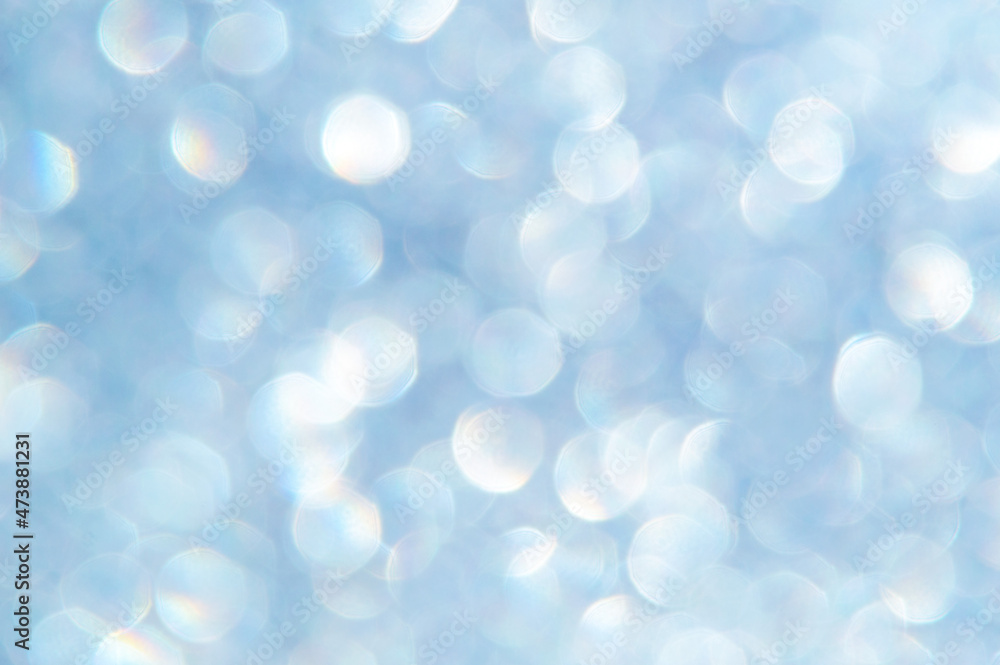 bright glitter background: bokeh effect from many colored lights on frozen glass, toning bright glitter background: bokeh effect from many colored lights on frozen glass, toning