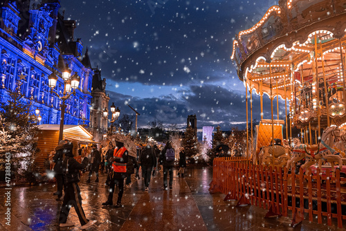 Magical Christmas market spirit in Paris, France. December 10, 2021. Celebrating new years eve. Happy holidays.