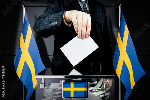 Sweden flags, hand dropping voting card - election concept - 3D illustration photo