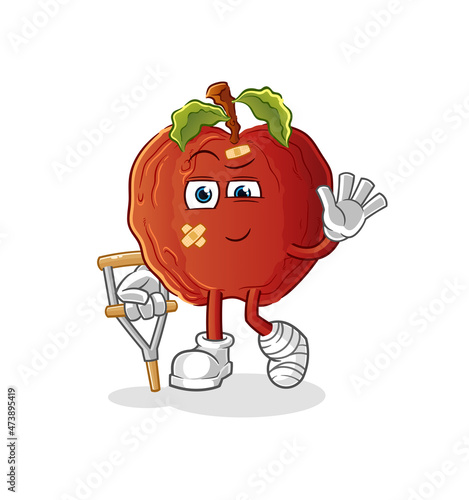 rotten apple sick with limping stick. cartoon mascot vector