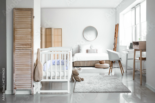 Interior of light bedroom w...