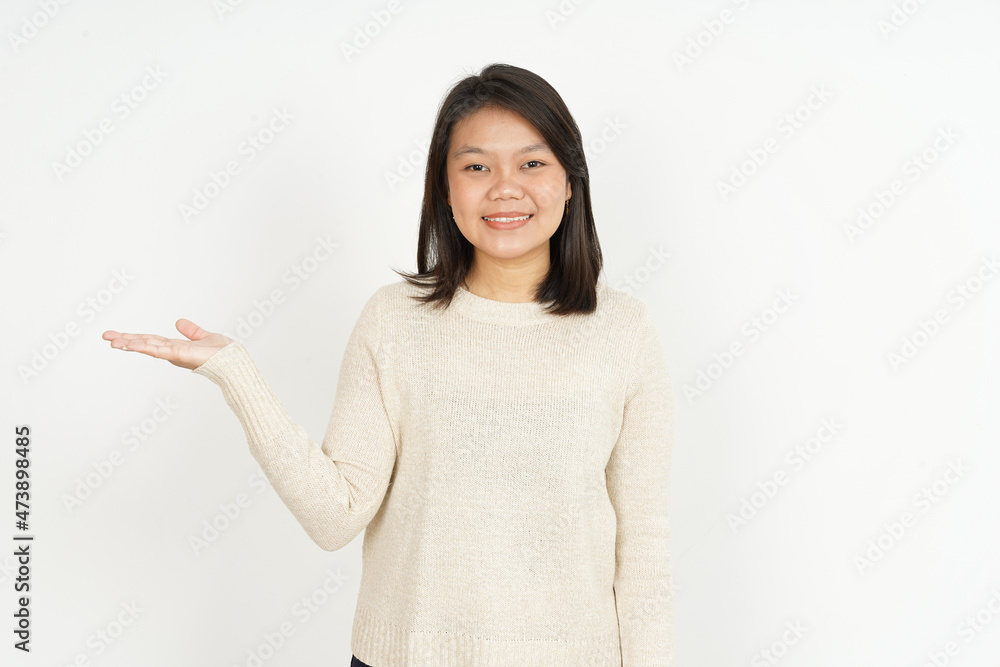 Showing recommended product on open palm of Beautiful Asian Woman Isolated On White Background Showing recommended product on open palm of Beautiful Asian Woman Isolated On White Background