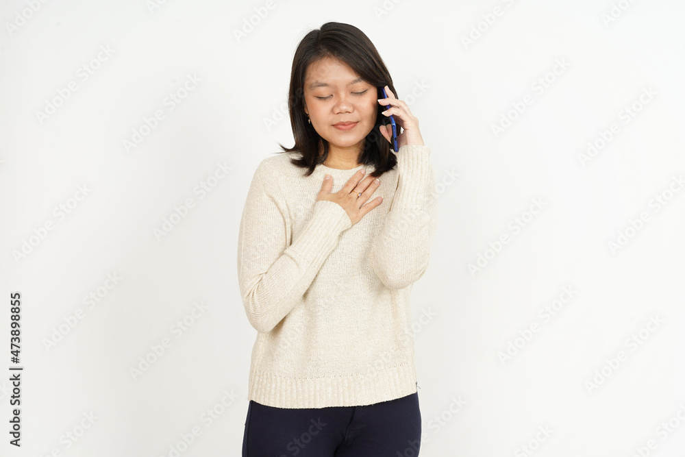 Talking on the phone and excited of Beautiful Asian Woman Isolated On White Background Talking on the phone and excited of Beautiful Asian Woman Isolated On White Background