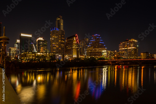 Beautiful night Austin cityscape over Colorado river. Texas  USA