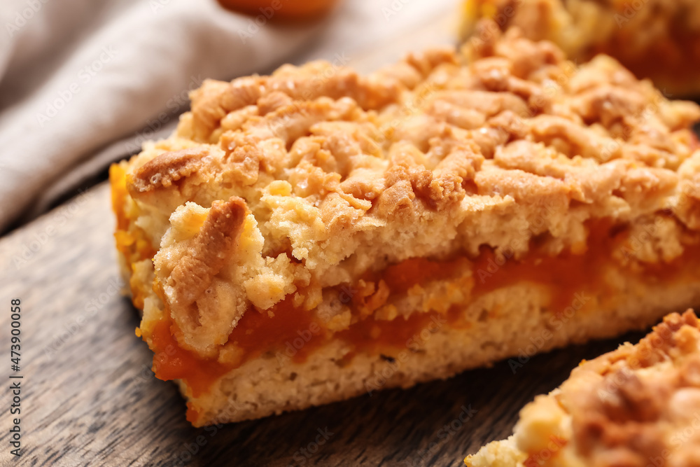 Pieces of tasty pumpkin pie on table, closeup Pieces of tasty pumpkin pie on table, closeup
