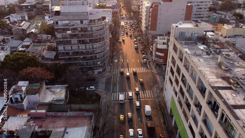 Aerial shot over busy street of Buenos Aires at sunset, Argentine