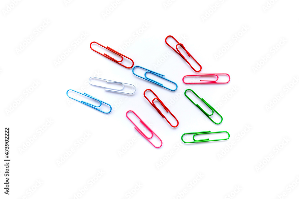 olorful paper clips on white background with copy space. olorful paper clips on white background with copy space.