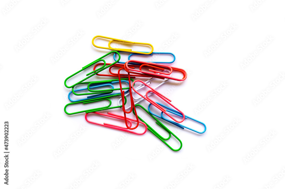 olorful paper clips on white background with copy space. olorful paper clips on white background with copy space.