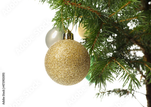 Christmas tree with beautiful balls isolated on white background, closeup