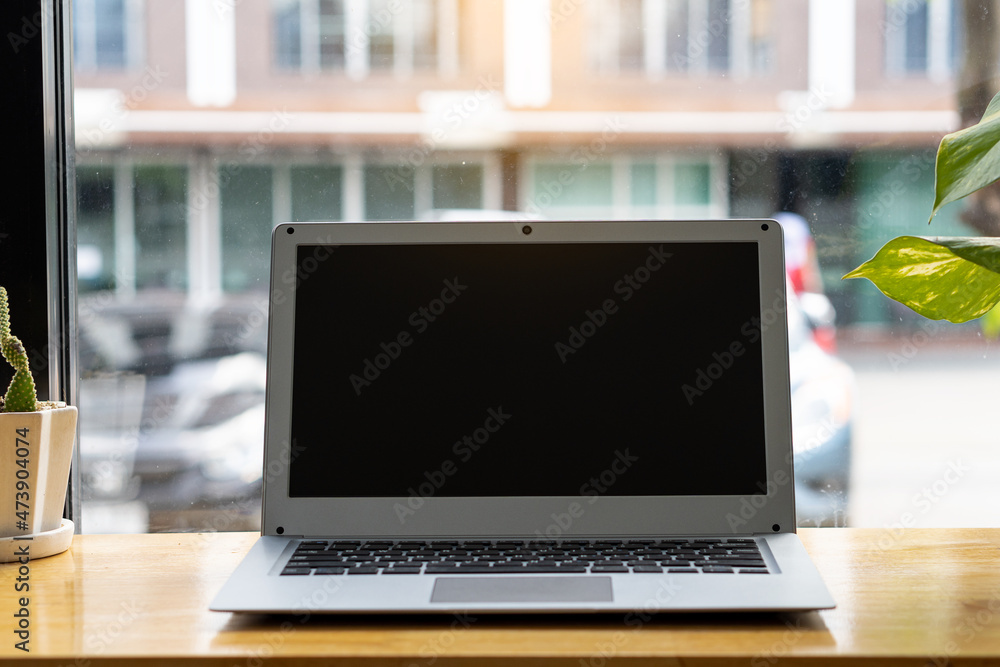 laptop computer on glass wall background table laptop computer on glass wall background table