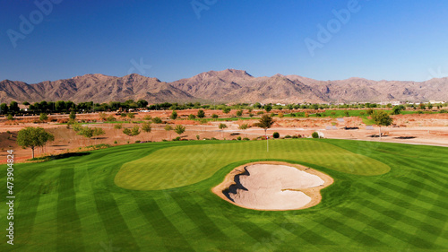 Scenic golf course hole in Phoenix Arizona.  photo