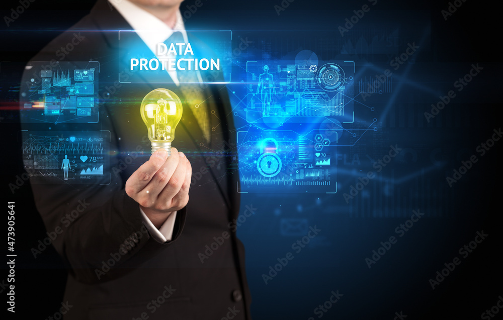 Businessman holding a light bulb, online security concept Businessman holding a light bulb, online security concept