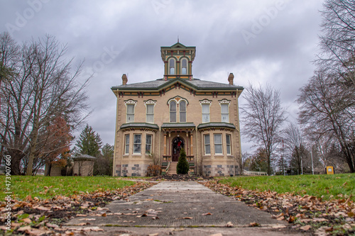 A low angle shot of Castle Killbride, a historic Victorian mansion in Baden (west of Kitchener), Ontario on an overcast day. photo
