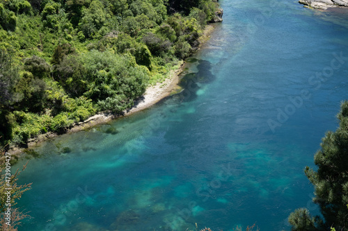Waikato River below in natural landscape at Taupo.