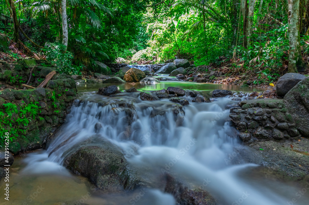 Kathu waterfall water gently flowing down the rocks Patong Phuket Thailand Asia Kathu waterfall water gently flowing down the rocks Patong Phuket Thailand Asia