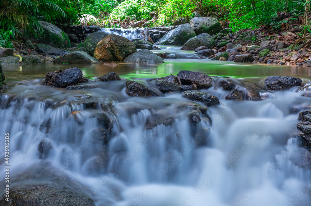Kathu waterfall water gently flowing down the rocks Patong Phuket Thailand Asia Kathu waterfall water gently flowing down the rocks Patong Phuket Thailand Asia