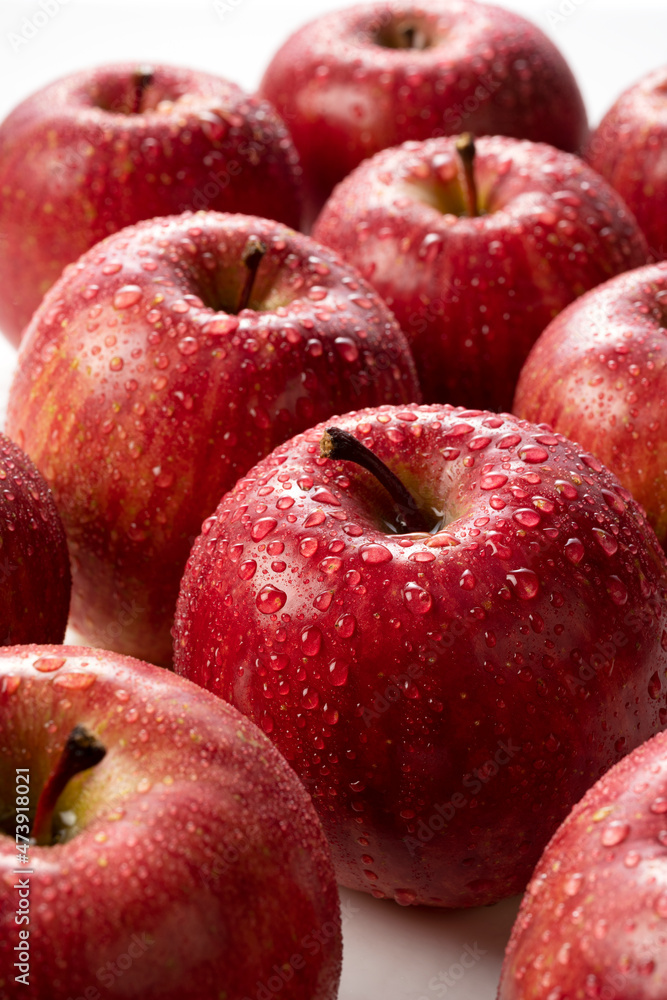Closeup of apples with water drops on white background. Closeup of apples with water drops on white background.