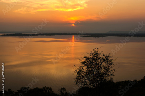 sunset over the river © Anucha