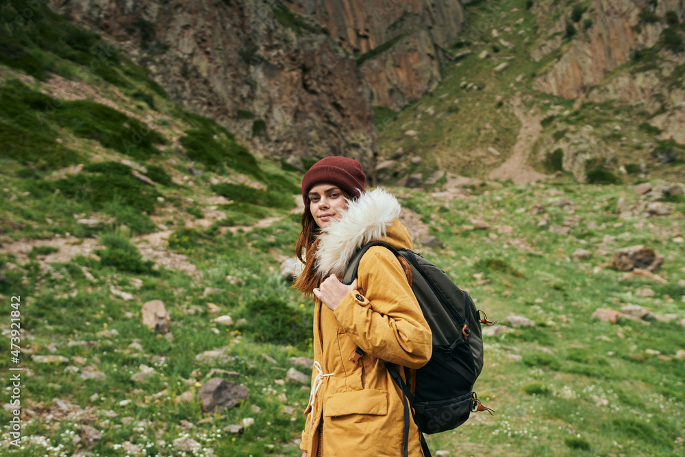 woman hiker with backpack mountains travel adventure freedom