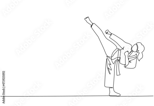 Single continuous line drawing young cute taekwondo woman doing kick pose in fight uniform with belt exercising martial art at gym. Healthy sport lifestyle concept. One line draw graphic design vector