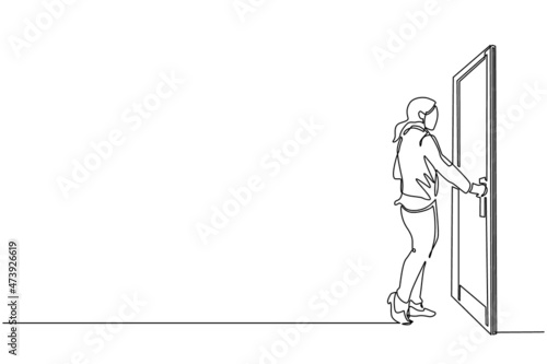 Single continuous line drawing businesswoman holding door knob. Entering room in office building. Girl holding door knob to open door and enter work space. Dynamic one line draw graphic design vector