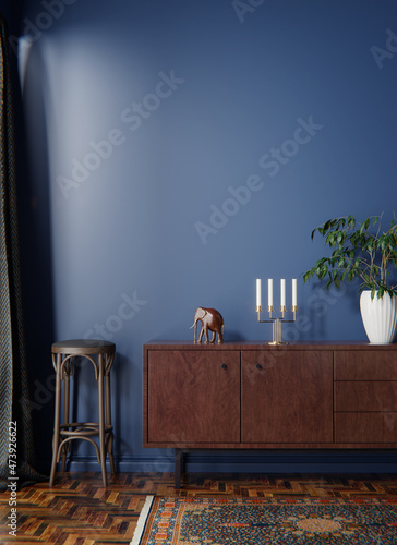 Commode with chair and decor in living room interior, dark blue wall mock up background, 3D render