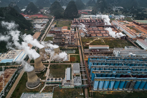 Aerial photography of an alumina plant built on a karst landscape photo