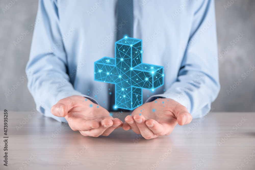Businessman hand holding 3D plus low polygonal icon.Plus sign virtual means to offer positive thing like benefits, personal development, social network Profit,health insurance, growth concepts. Businessman hand holding 3D plus low polygonal icon.Plus sign virtual means to offer positive thing like benefits, personal development, social network Profit,health insurance, growth concepts.