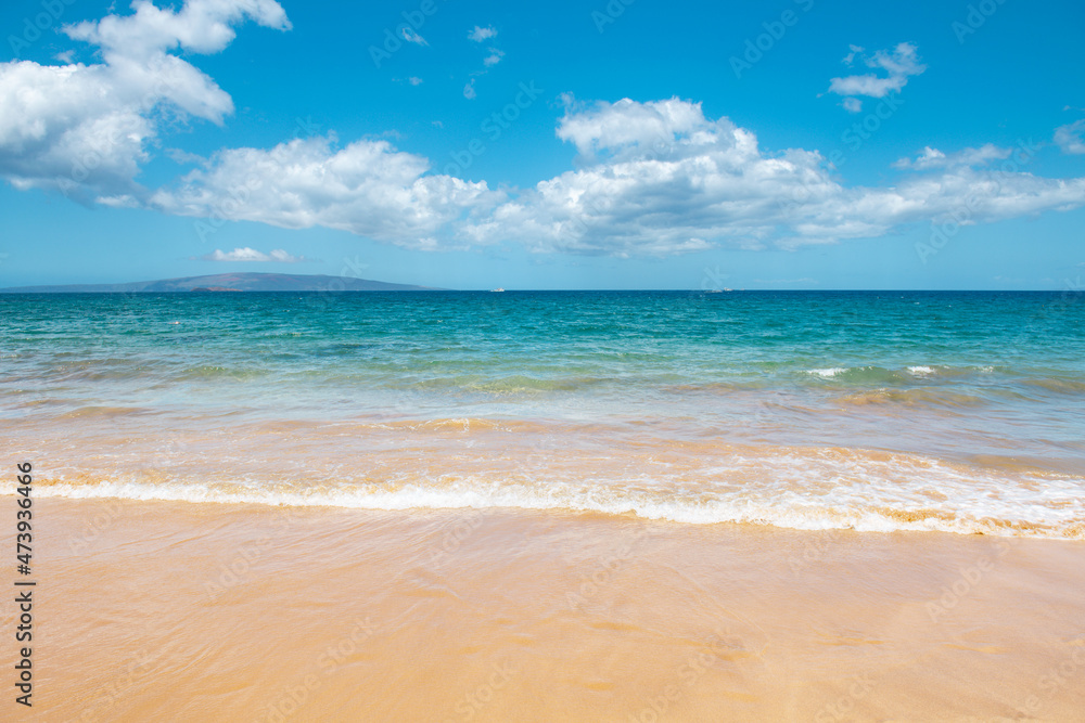 Sea background, nature of tropical summer beach with rays of sun light. Sand beach, sea water with copy space, summer vacation concept.