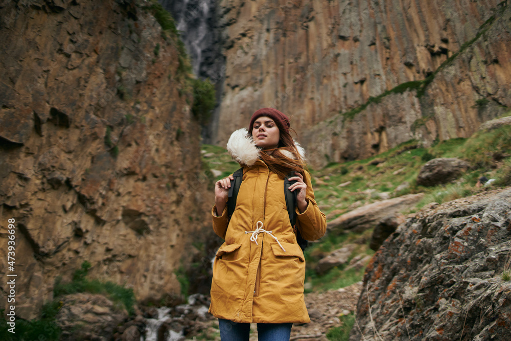 Fototapeta premium woman hiker with backpack mountains travel adventure freedom