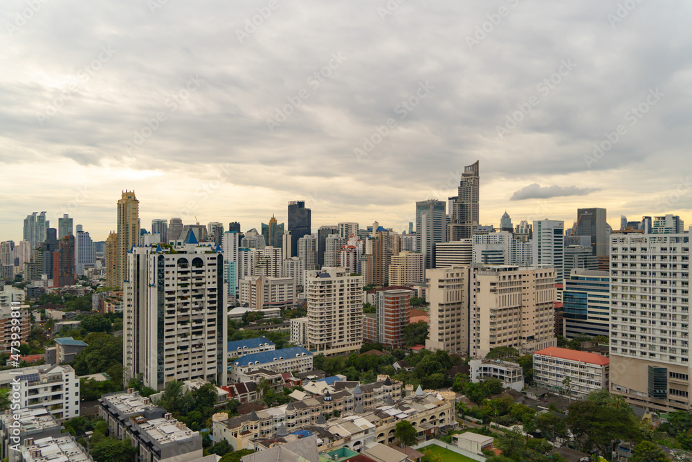 Aerial view of Bangkok Downtown Skyline, Thailand. Financial district and business centers in smart urban city in Asia. Skyscraper and high-rise buildings at sunset. Aerial view of Bangkok Downtown Skyline, Thailand. Financial district and business centers in smart urban city in Asia. Skyscraper and high-rise buildings at sunset.