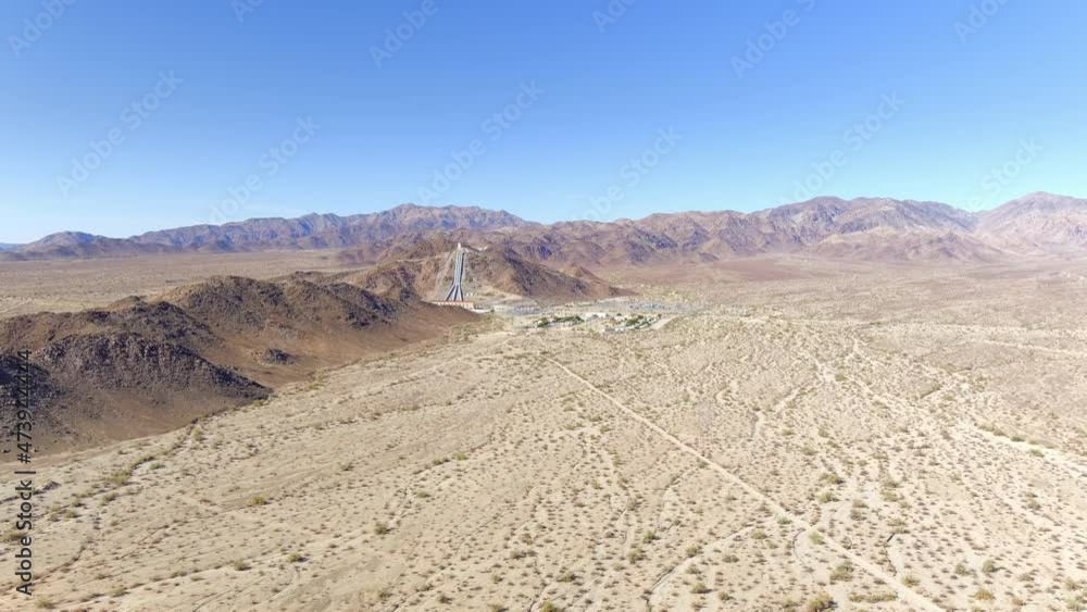 Power station in the middle of the desert, aerial view of energy generation facility Power station in the middle of the desert, aerial view of energy generation facility