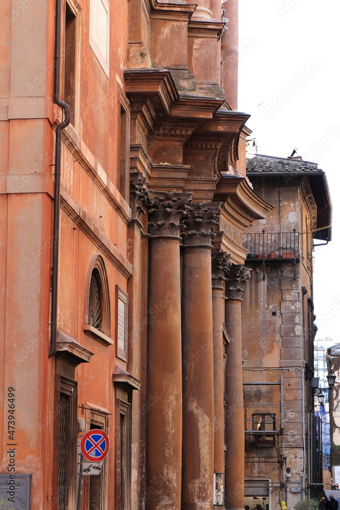 Rome Street View with Colorful Building Facades and Aged Corinthian Church Columns, Italy