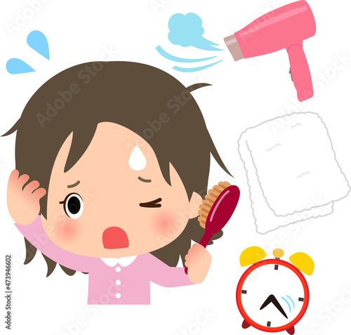 焦って寝ぐせを直す女性