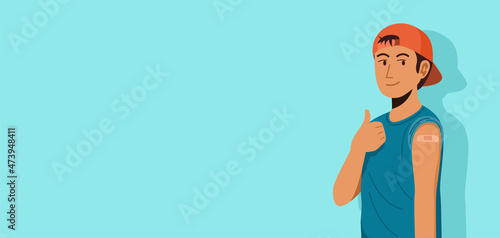 A boy showing his arm with bandage after receiving covid-19 vaccine with blank space.