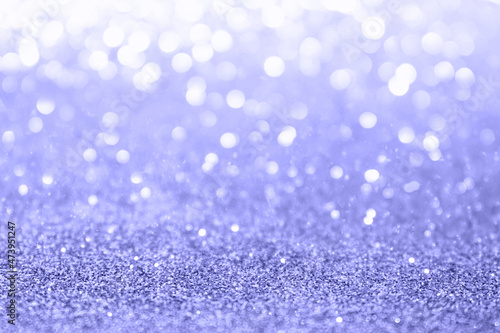 Beautiful light violet abstract background with bokeh defocused lights.