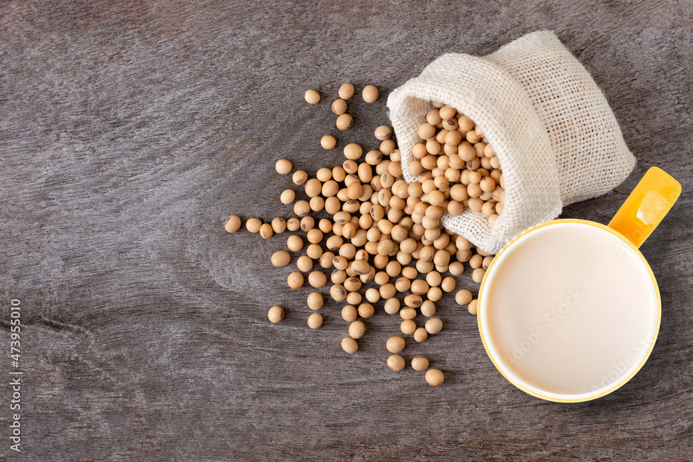 soy milk isolated on wooden table background. Top view. Flat lay. Copy space.